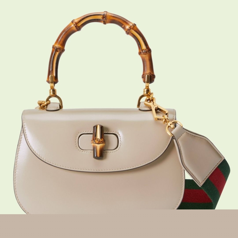 G*u*i top handle bags